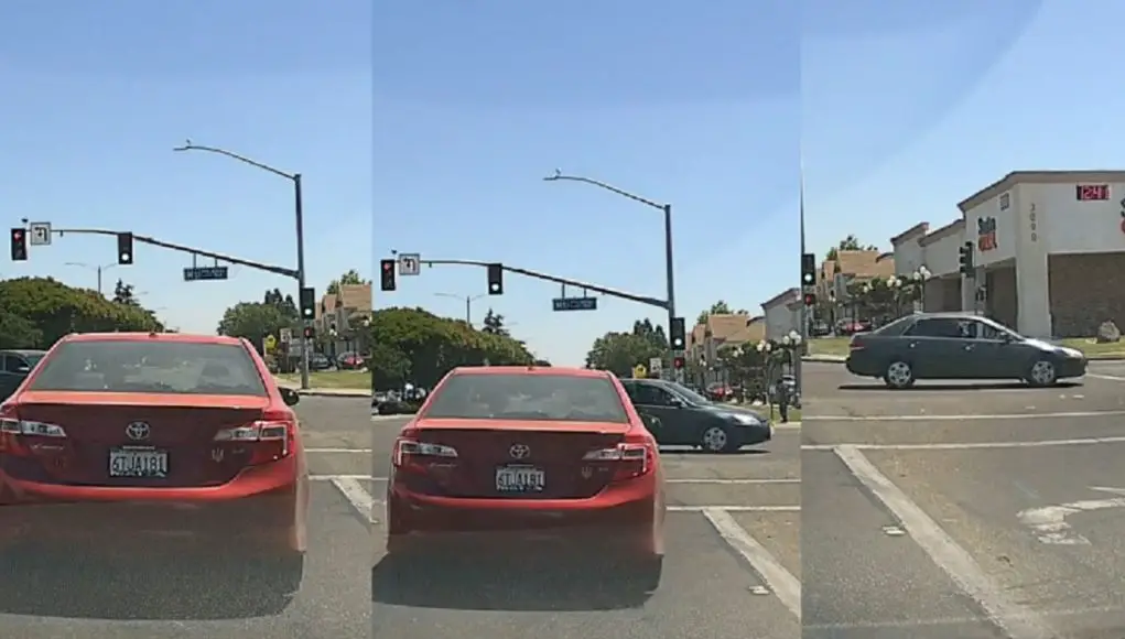 Merced, CA: Extreme Red Light Runner Turning Onto M St from Olive Ave Distracted, Too Busy Looking At His Phone Extreme Red light runner spotted on dashcam turning onto M St. from Olive Ave.