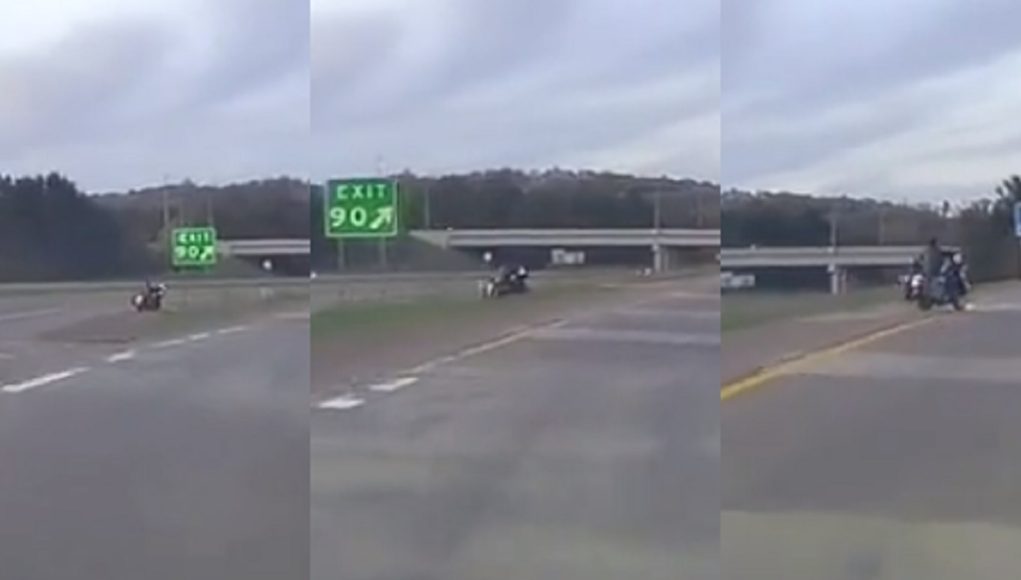 Motorcyclist goes off-roading exiting the 53 in Eau Claire Harley rider on the 53 goes off-roading through gore point embankment so he doesn't miss his exit.