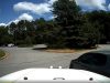 Goofball turning on Water Pl turns left from the far right lane. Almost gets t-boned by dashcam owner forced to emergency brake.