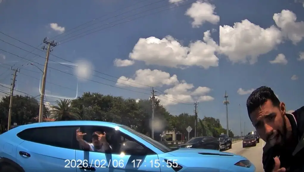 Dashcam owner ignores Lambo Service Employee trying to block traffic, turns onto Volunteer Rd anyway.