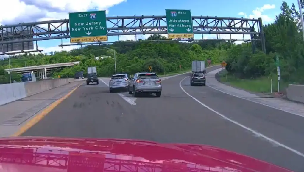 Two idiots, not wanting to miss their exit, both pass in the gore zone, nearly taking each other out.