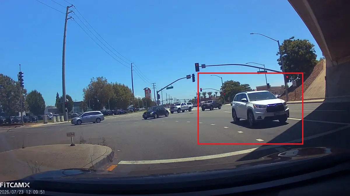 Old lady driver gets confused turning left onto Chino Hills Parkway. Drives against oncoming traffic.