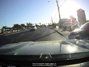 Distracted teen driver exiting 40th & Greenway shopping plaza t-bones driver creeping along with the right of way, all caught on dashcam.