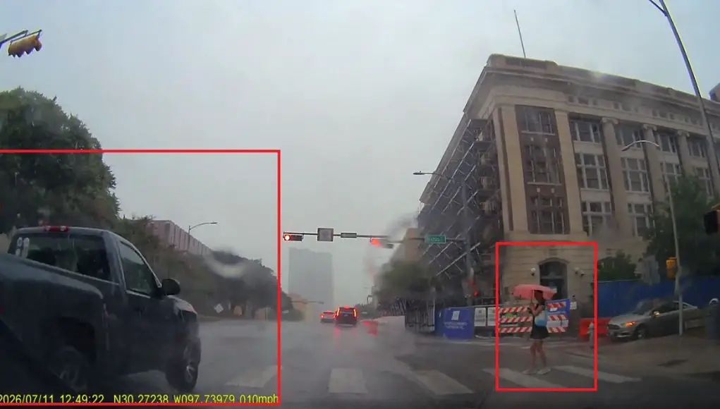 Austin, TX: Red Light Runner At 11th & Brazos Nearly Plows Into Pedestrian, Gets Stuck At Next Light Anyway Goofball runs red light at 11th and Brazos, nearly runs over girl pedestrian just trying to cross.