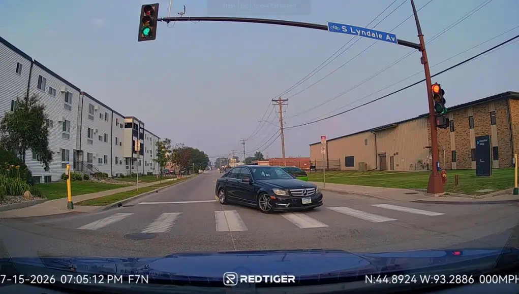 W 61st and Lyndale Ave Driver turning onto Lyndale from W 61st st. refuses to yield to dashcam owner with right of way. Almost causes own collision.