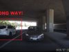 Old lady driver gets confused turning left onto Chino Hills Parkway. Drives against oncoming traffic.