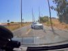 Driver on Porter refuses to yield to oncoming driver before they decide to turn, almost causes head-on crash.