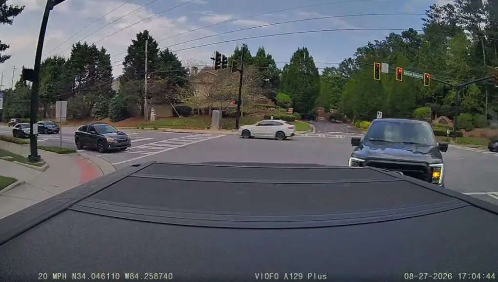 Driver turning onto Waters fails to yield to oncoming traffic with the right of way, comes within feet of crashing.