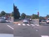 Careless driver makes right at Hillsborough & Pullen Roundabout without yielding for pedestrian, immediately pulled over by NC State police.