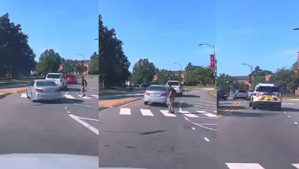 Careless driver makes right at Hillsborough & Pullen Roundabout without yielding for pedestrian, immediately pulled over by NC State police.