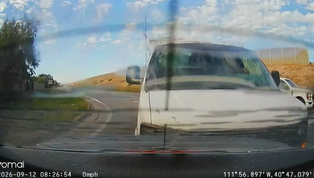 Driver on 215 off-ramp not paying attention, rear-ends right on red turner after assuming they went when, in reality, they stopped to yield one more time.
