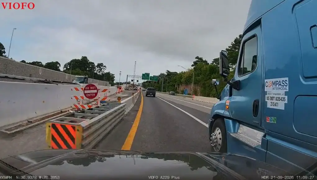 Distracted Semi truck driver on I-64 drifts into wrong lane, almost sandwiches driver into side of freeway.