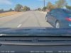 No look lane change on Dallas Parkway ends in near collision and instant justice from Frisco Police.