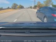 No look lane change on Dallas Parkway ends in near collision and instant justice from Frisco Police.
