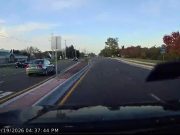 Woman driver turns the wrong way onto Hunt Club Dr, spotted driving into oncoming traffic for over 100 meters.